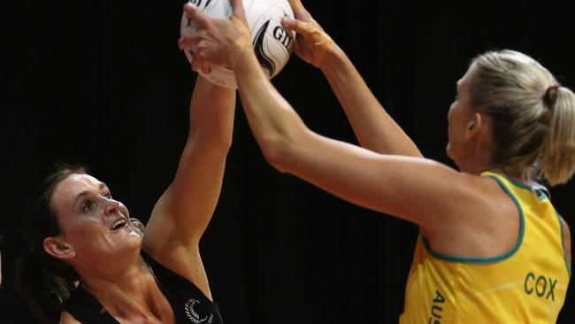 New Thunderbirds recruit Leana de Bruin, playing for New Zealand, defends Australia’s Catherine Cox in 2012. Picture: Sandra Mu (Getty Images)
