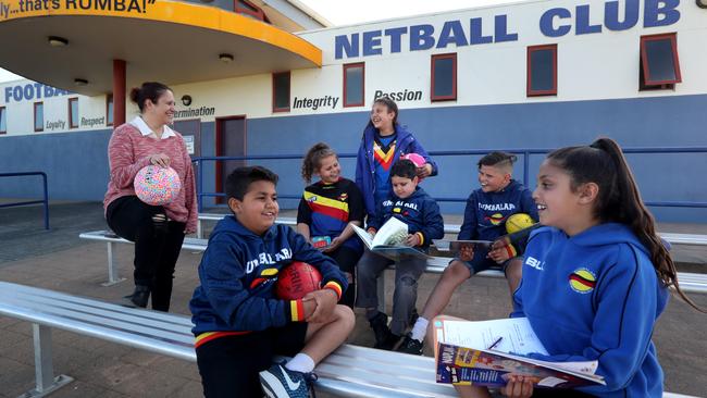 Kylie Briggs with Caleb Nicholson, Jarris Tass, Tallara Saunders, Mason Nicholson, Ngtaeo Tass and Miah Saunders at the Rumbalara Football and Netball Club in Shepparton, Victoria. Picture: David Geraghty.