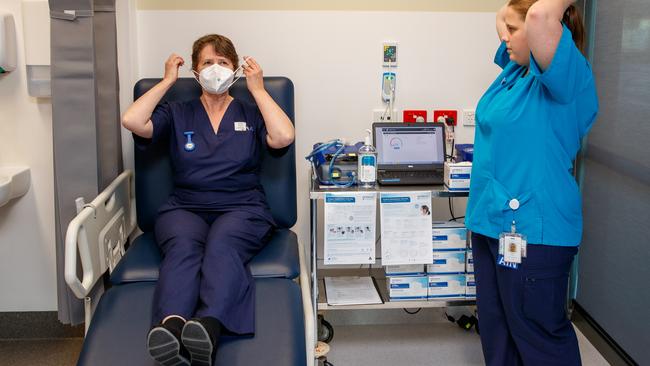 Nurses Hannah Webber and Gillian Osman test new Detmold masks at the RAH.