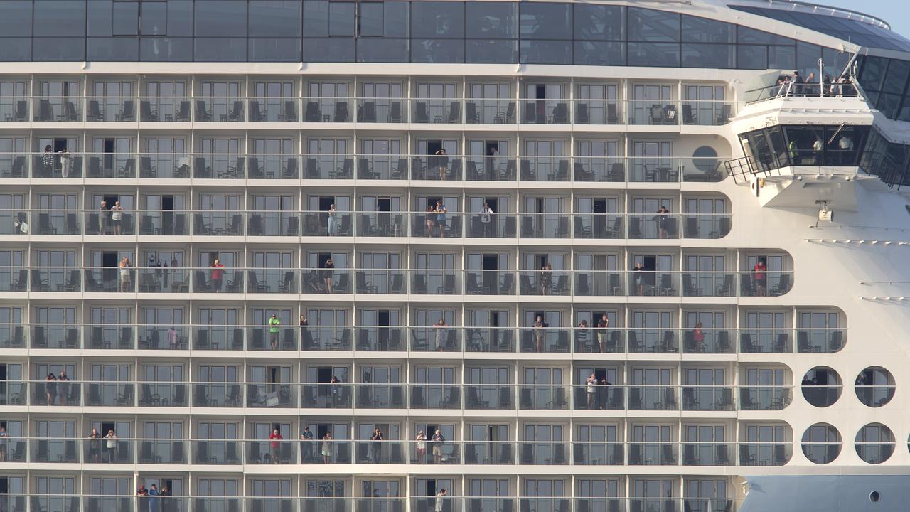 Passengers on-board Ovation of the Seas waved to locals from their balcony as they set sail to Picton. Picture: John Boren/Getty Images.