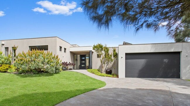 This four-bedrom house at 58 Casuarina Drive, Cape Schanck, is for sale with a $1.7m-$1.8m price guide, slightly below area’s $1.95m house price median.