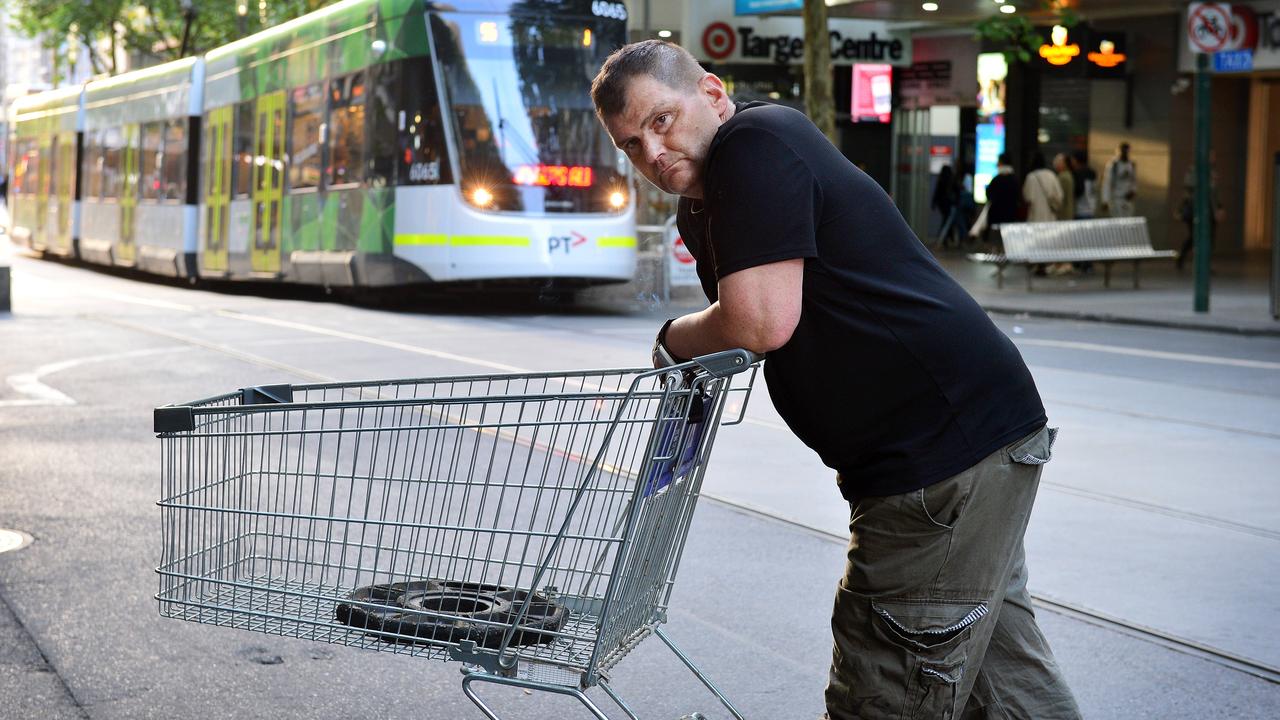 A shy and humble Mr Rogers didn’t want to comment further when approached by the Sunday Herald Sun but agreed to pose for this photo with the trolley he used to fend off a terrorist. Picture: Nicki Connolly.