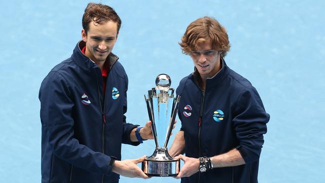 Russia’s two-headed monster Daniil Medvedev and Andrey Rublev pose with the spoils of their ATP Cup final victory. Picture: Getty Images