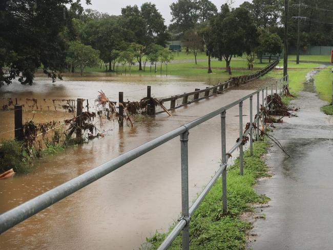 A footpath on Somerset Drive Mudgeeraba on the Gold Coast is closed to all foot traffic after it was inundated with flood water after heavy rainfall fell over the City. NCA NewsWire / Scott Powick