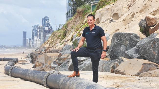 Councillor Darren Taylor inspects the damage on Tuesday caused by huge seas from Cyclone Alfred at Narrowneck. Picture: Glenn Hampson.