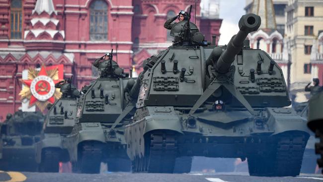 MSTA-S self-propelled howitzers parade through Red Square during the Victory Day military parade in central Moscow on Monday. Picture: AFP