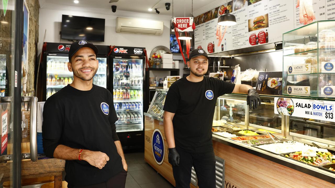 Ayush Nepal and Amir Parajuli at the Little Greece Gyros and Souvlaki Bar in Parramatta. Picture: Jonathan Ng