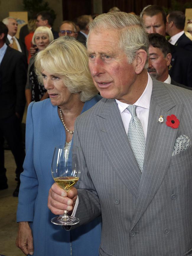 Prince Charles and Camilla, Duchess of Cornwall, enjoy some winetasting during a tour of New Zealand in 2015. Picture: Reuters