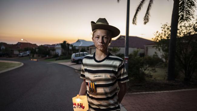 Damon De Winter during a driveway service for ANZAC Day after the WA government ordered a three day lockdown. Picture: NCA NewsWire / Tony McDonough