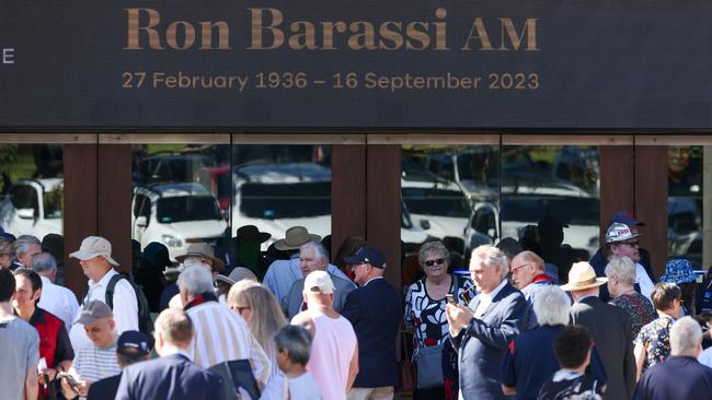 Patrons line up to enter the Victoria State Memorial Service held for Ron Barassi. Picture: Getty Images