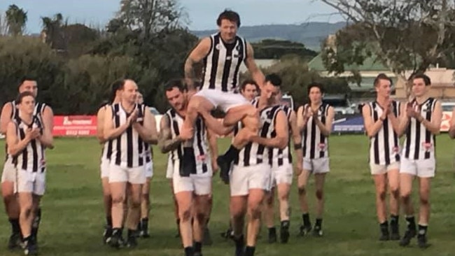 Reynella player Jason Farrier being chaired off after his 250th game. Picture: Supplied, Reynella Football Club