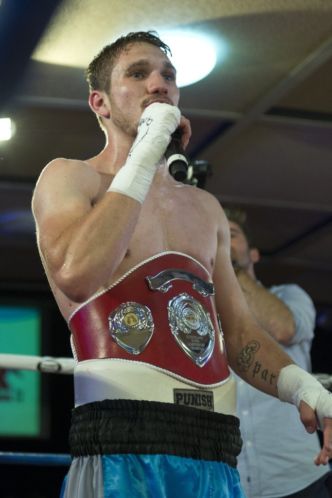 Steven Spark with the Queensland super lightweight belt after fighting Mark Ramirez on the Smithy and TGW Bring The Big Fights 14 card at Rumours International, Saturday, October 22, 2016. Picture: Kevin Farmer