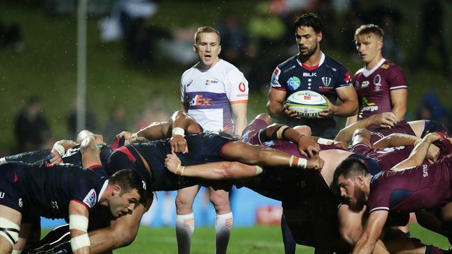 SYDNEY, AUSTRALIA - JULY 10: Referee Damon Murphy talks to players during the round 2 Super Rugby AU match between the Rebels and the Reds at Brookvale Oval on July 10, 2020 in Sydney, Australia. (Photo by Mark Metcalfe/Getty Images)