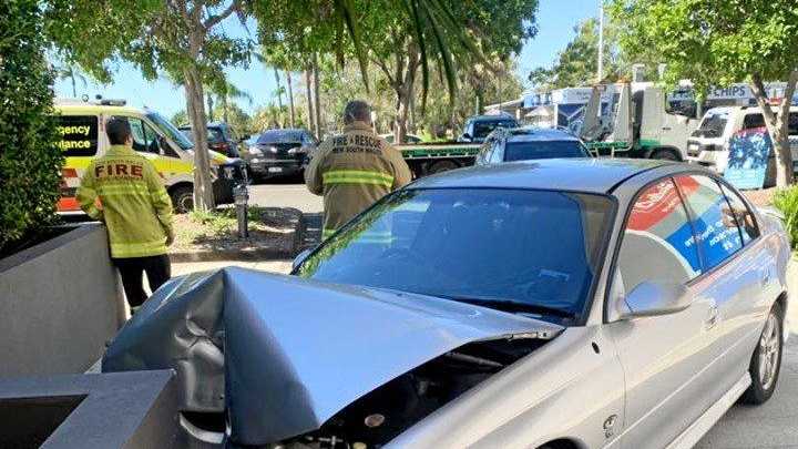 A woman has escaped injury after crashing her car into a wall in Tweed Heads.