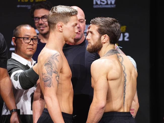 SYDNEY, AUSTRALIA - FEBRUARY 07: (L-R) Opponents Colby Thicknesse of Australia and Aleksandre Topuria of Germany face off during the UFC 312 ceremonial weigh-in at Qudos Bank Arena on February 07, 2025 in Sydney, Australia. (Photo by Jeff Bottari/Zuffa LLC)