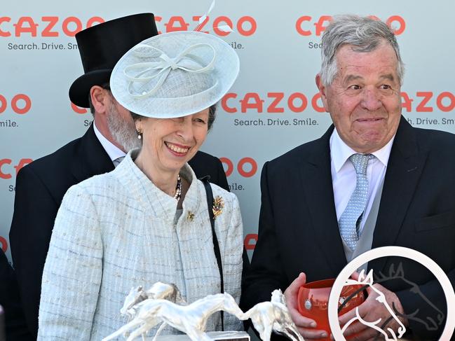 Princess Anne, Princess Royal (L) and winning trainer of Desert Crown, Sir Michael Stoute (R) are seen at the presentation for the Derby. Picture: AFP