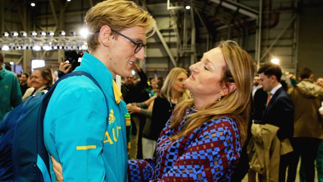 Swimmer Mack Horton is hugged by his Mother Cheryl as Australia’s Olympians arrived home at Sydney Airport. Picture: Mark Evans