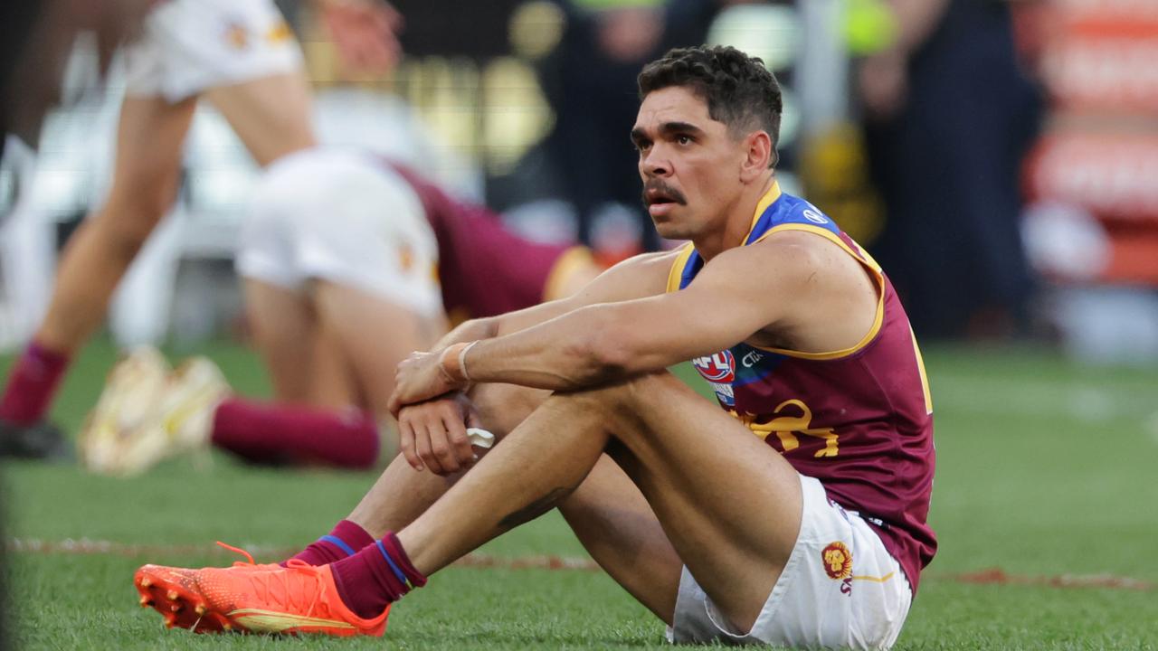 A shattered Charlie Cameron after the siren sounds at the 2023 AFL Grand Final where Collingwood defeated the Brisbane Lions by 4 points at the MCG. Picture Lachie Millard