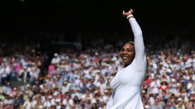 Serena Williams celebrates after beating Germany's Julia Goerges 6-2 6-4 in their Wimbledon semi-final