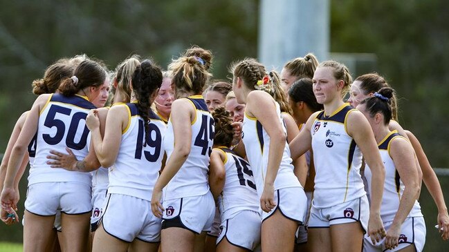 The Bond University Bull Sharks huddle up during their round 1 clash. Pic: Jessy Hart