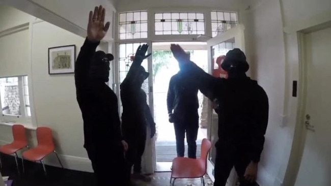 The same group performed the Nazi salute inside the Premier's office.