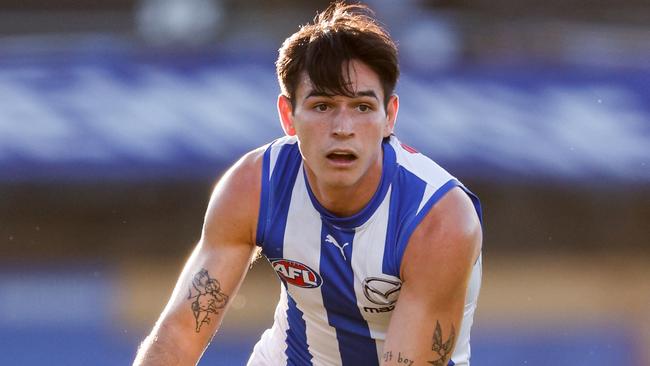 ADELAIDE, AUSTRALIA - APRIL 05: Zac Fisher of the Kangaroos in action during the 2024 AFL Round 04 match between the Brisbane Lions and the North Melbourne Kangaroos at Norwood Oval on April 05, 2024 in Adelaide, Australia. (Photo by Dylan Burns/AFL Photos via Getty Images)