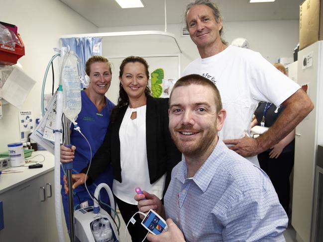 Dave Noonan, right, with former Heart 107.3 co-host Kylie Baxter, second from left, and paediatric nurse Alice Barber and senior paediatric doctor Ben Nind with new medical equipment for the Royal Hobart Hospital that had been provided through Give Me Five For Kids finds in 2015. Picture: KIM EISZELE