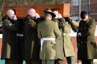 Diggers finally laid to rest in Fromelles | Herald Sun