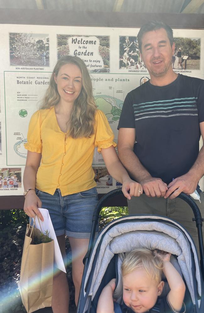 Hannah, Chay and little Leo enjoying a lamington at the Australia Day ceremony at the Botanic Gardens in Coffs Harbour. Picture: Matt Gazy