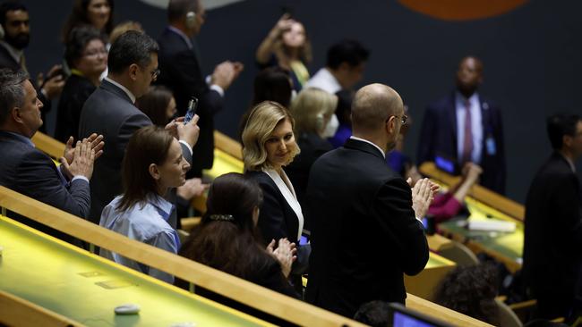 Ukrainian first lady Olena Zelenska, centre, stands to applaud the speech by her husband, Volodymyr Zelensky, in New York. Picture: Getty Images/AFP