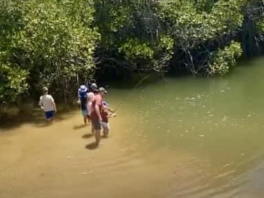 Residents warn of crocodile danger as children fish in Deep Creek. Picture: Supplied.