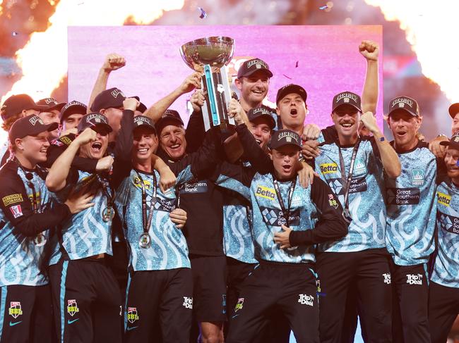 SYDNEY, AUSTRALIA - JANUARY 24:  Brisbane Heat hold aloft the BBL trophy and celebrate victory during the BBL Final match between Sydney Sixers and Brisbane Heat at Sydney Cricket Ground, on January 24, 2024, in Sydney, Australia. (Photo by Matt King/Getty Images)