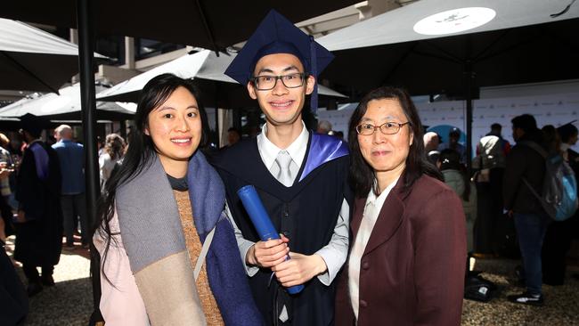 Leanne, David and Peggy Kwok at Deakin University post-graduation celebrations on Friday afternoon. Picture: Alan Barber