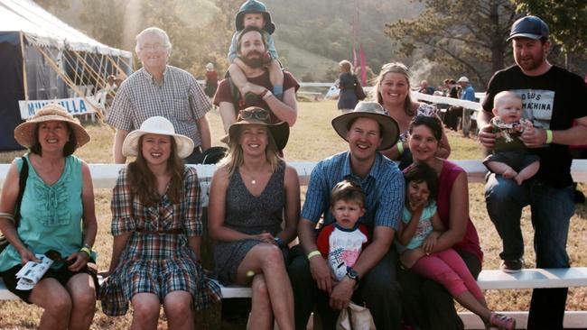 Robert Dunn, far left on back row, with four children and partners, wife, Carolyn, and grandchildren. Picture: Supplied.