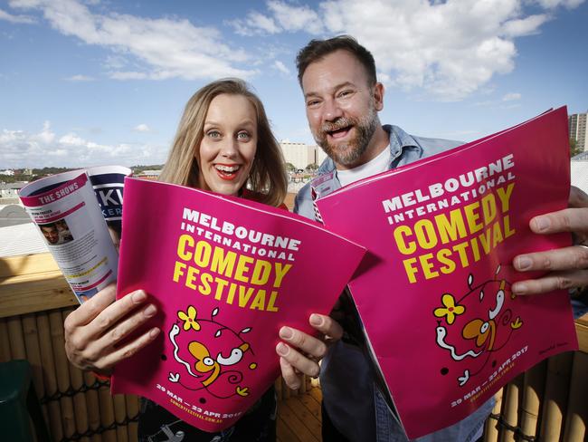 Comedians Claire Hooper and Anthony “Lehmo” Lehmann hawk the Melbourne International Comedy Festival program. Picture: David Caird