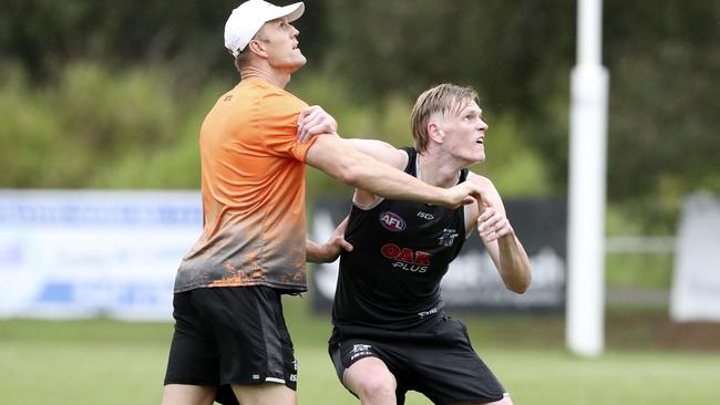 NO PUSHOVER: Sam Hayes (right) goes head-to-head at training with ruck coach Dean Brogan. Picture: SARAH REED.