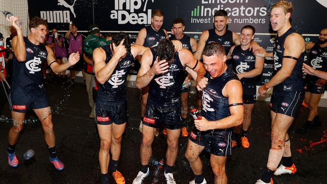 Carlton players celebrate their win in the rooms. Picture: Getty Images