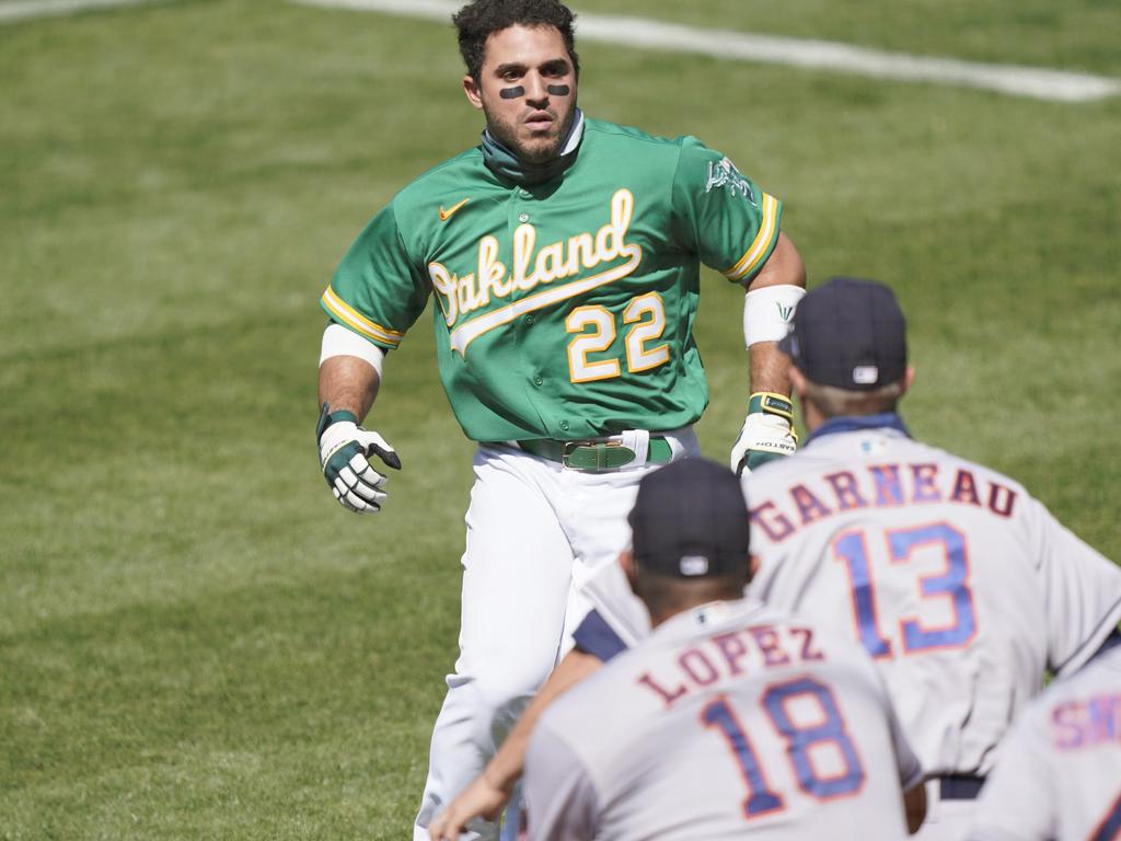 Ramon Laureano of the Oakland Athletics charges towards the Houston Astros dugout after he was hit by a pitch.