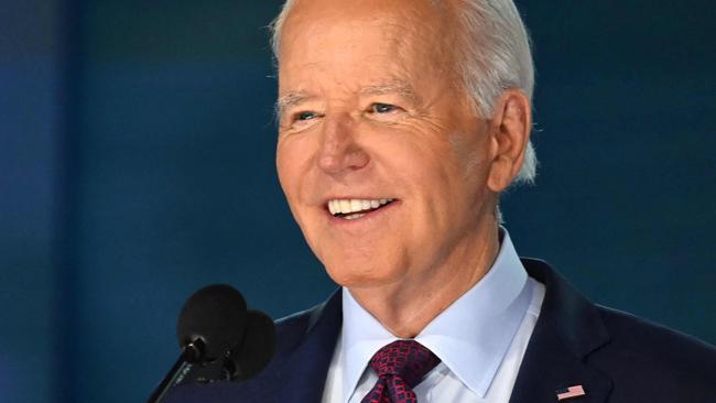 US President Joe Biden does a stage check. Picture: Andrew Caballero-Reynolds/AFP