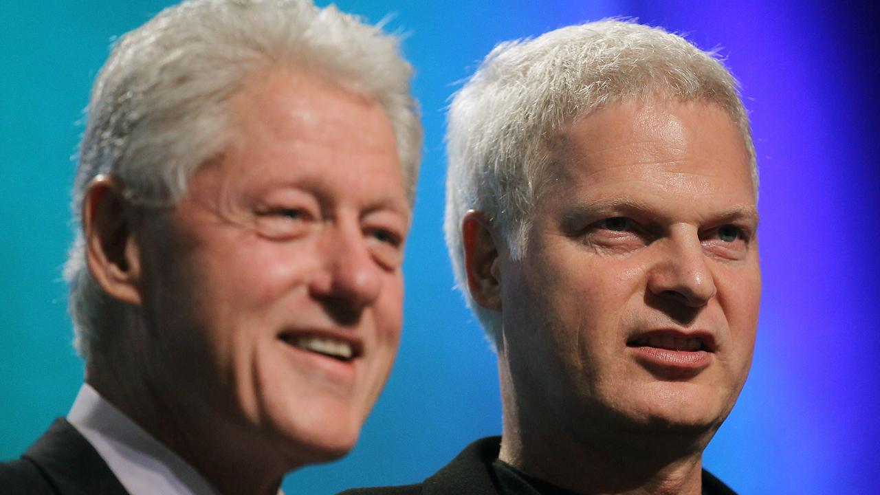 Bing (right, with Bill Clinton) was a prolific donor to the Clinton Foundation. Picture: AFP