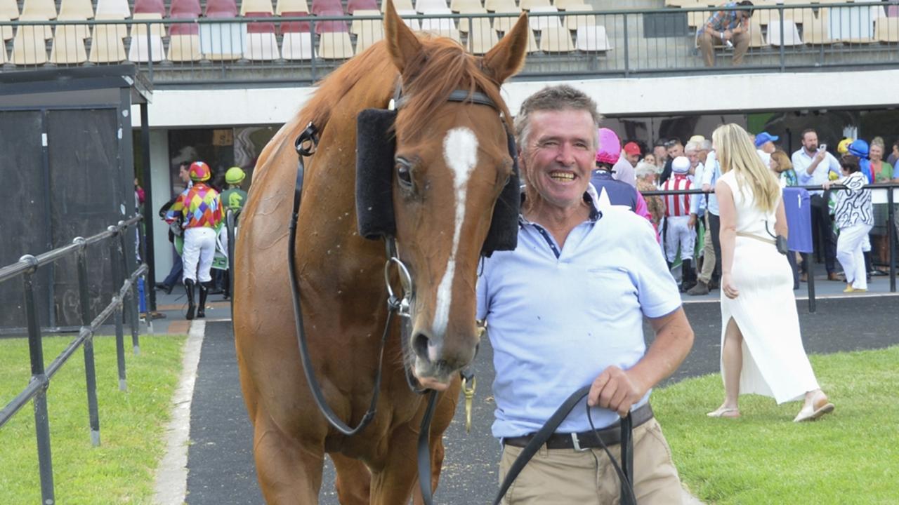 Mountain Chatter with trainer John Nisbet after a win in Canberra last November. Picture: Bradley Photos