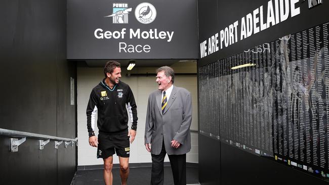  Legendary Port Adelaide footballer Geof Motley unveils the Geof Motley Race at Adelaide Oval with outgoing Power captain Travis Boak in 2014. Picture: SARAH REED.