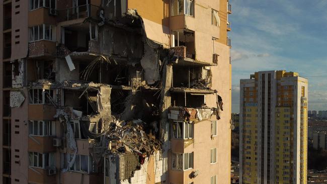 Damage to the upper floors of a building in Kyiv on February 26, 2022, after it was reportedly struck by a Russian rocket. Picture: AFP