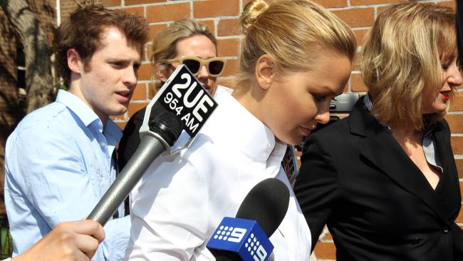 Lara leaves court after pleading guilty to a driving charge.
