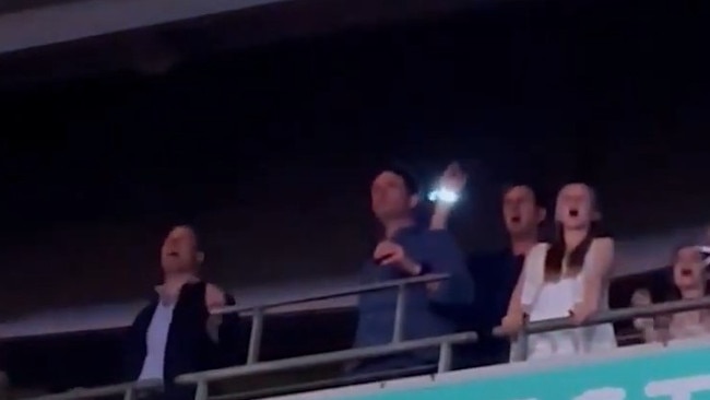 Prince William (left) is captured on video dancing at a Taylor Swift concert. Picture: YouTube