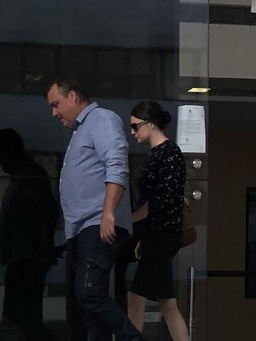 Paul MacDonald and Kathryn Goddard leave Newcastle Local Court. The two Hunter police officers were convicted of taxation fraud. Picture Amy Ziniak