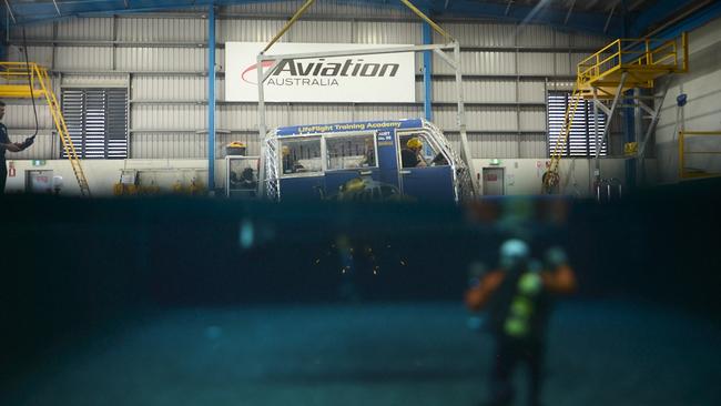 LifeFlight Townsville conducts HUET (Helicopter Underwater Escape Training) to simulate escaping a helicopter crash into water