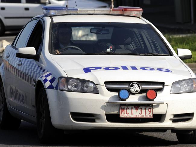 Police block Frankston Flinders Road in Somerville to investigate an alleged aggravated burglary.