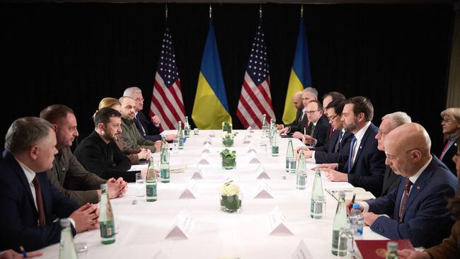 Ukraine Volodymyr Zelenskyy and Vice President of the United States JD Vance sit opposite one another at a German State dinner on the sidelines of the Munich Security Conference. Picture: AFP