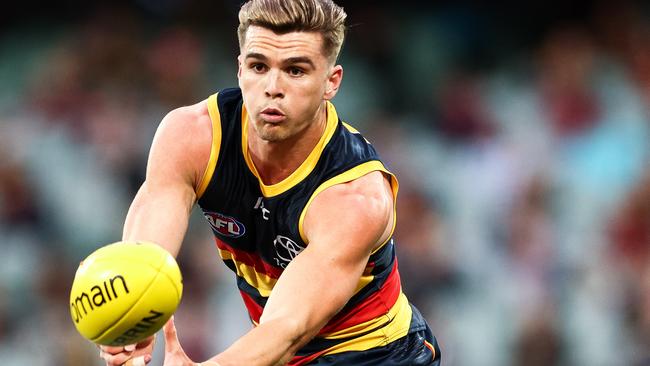 : Ben Keays of the Crows handballs during the round 16 AFL against Greater Western Sydney (Photo by Daniel Kalisz/Getty Images)